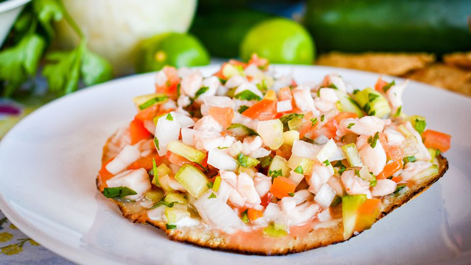 White fish ceviche on tostadas is a favorite seafood dish. - Marotoson/Adobe Stock