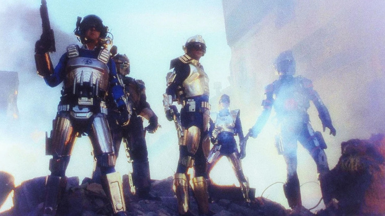 Several armored futuristic warriors