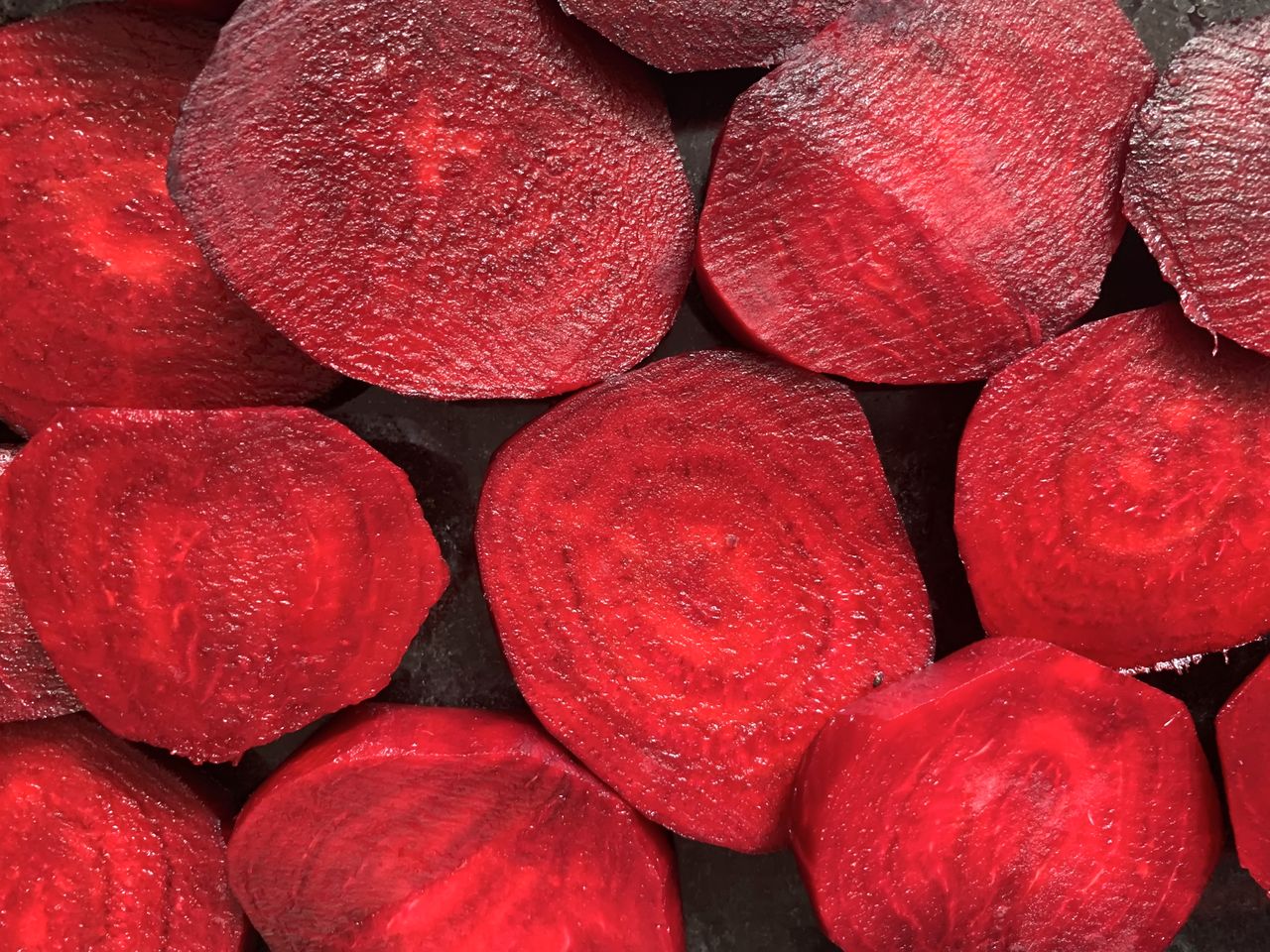 Closeup view of halved beetroots arranged together
