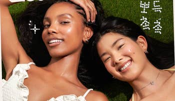 Two people lying on grass, smiling, promoting Korean skincare