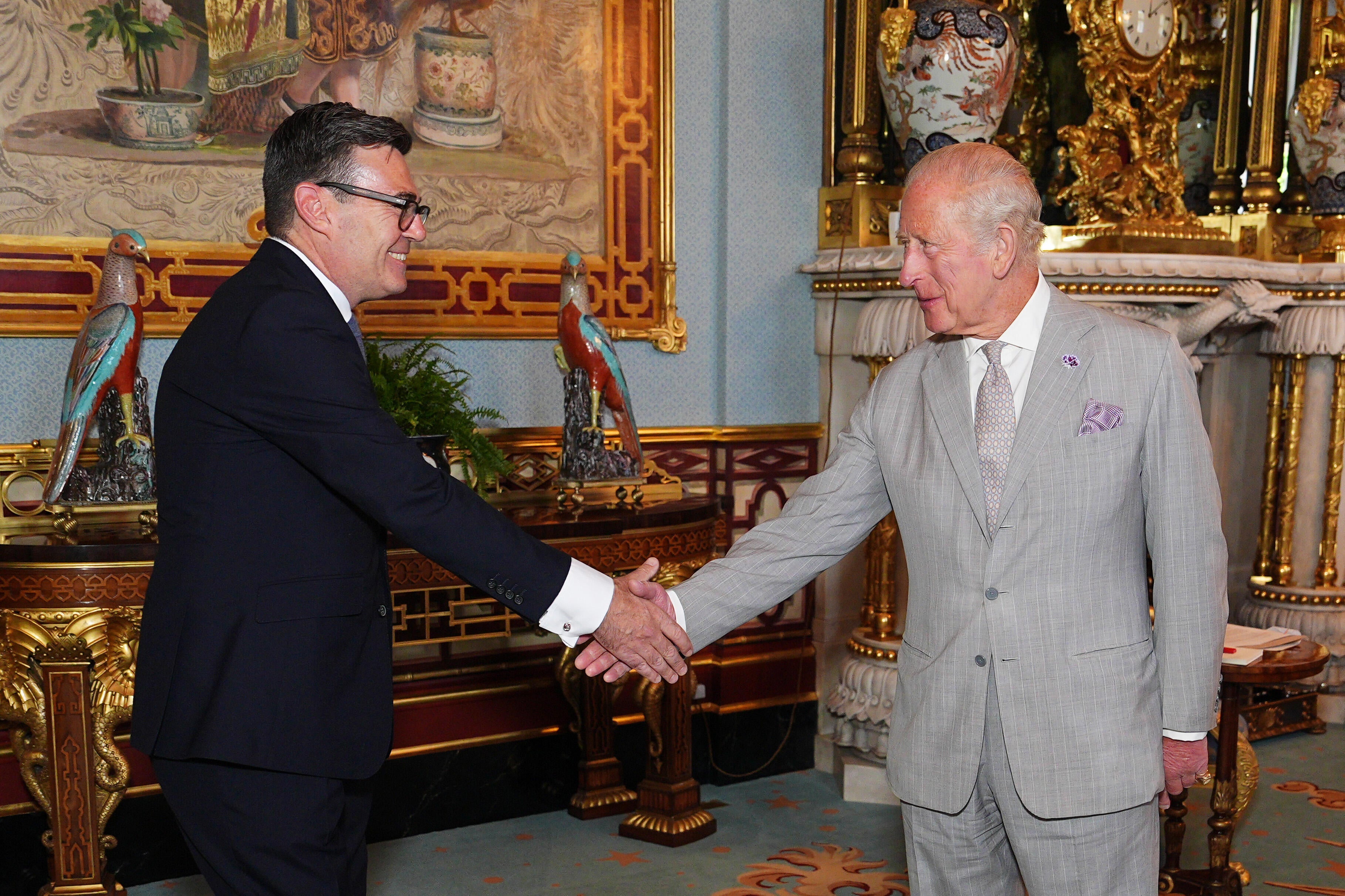 King Charles III welcomes Andy Burnham, during an audience at Buckingham Palace, London, where he invited the leader of the Labour Party to become Prime Minister and form a new government, July 20, 2026 in London, England. / Credit: Aaron Chown/Pool/Getty