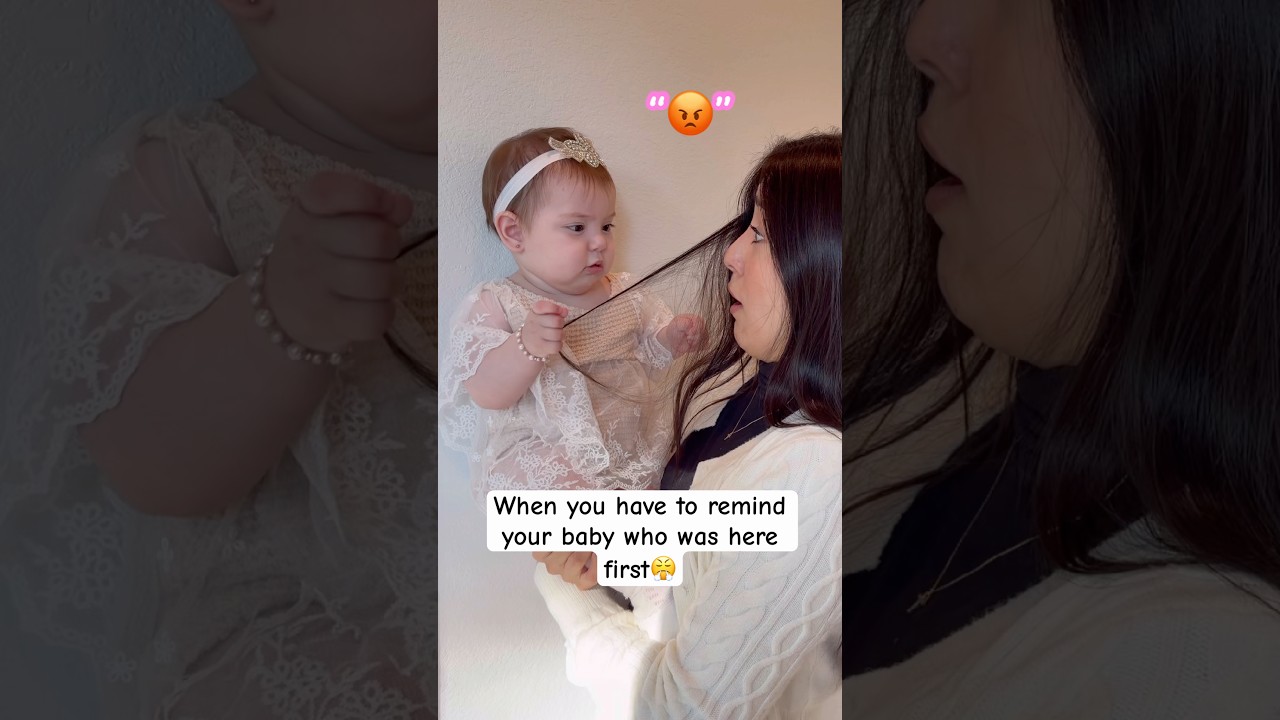 Baby hilariously pulls hair during a funny confrontation