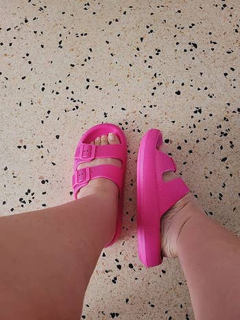 Person wearing two different styles of pink sandals on terrazzo flooring, showcasing footwear options