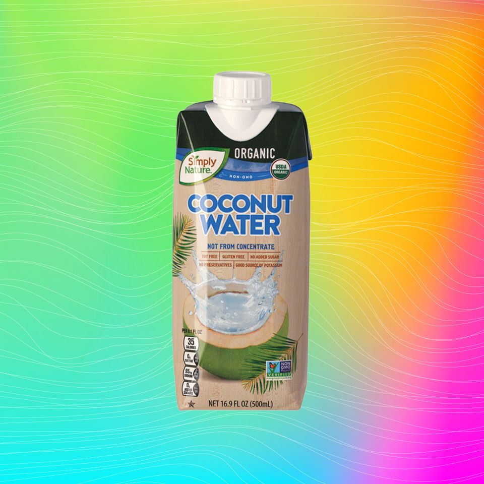 A carton of organic coconut water from Aldi on a colorful background