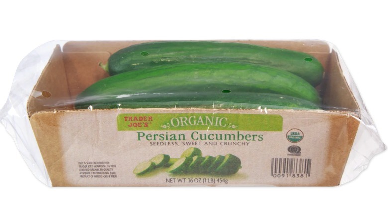Organic Persian cucumbers in a paper container