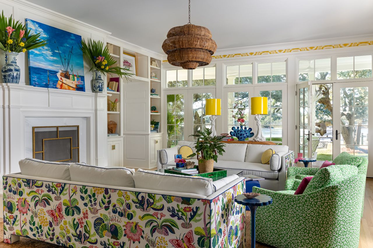 Living room designed by Grey Joyner Interiors featuring a floral-upholstered sofa