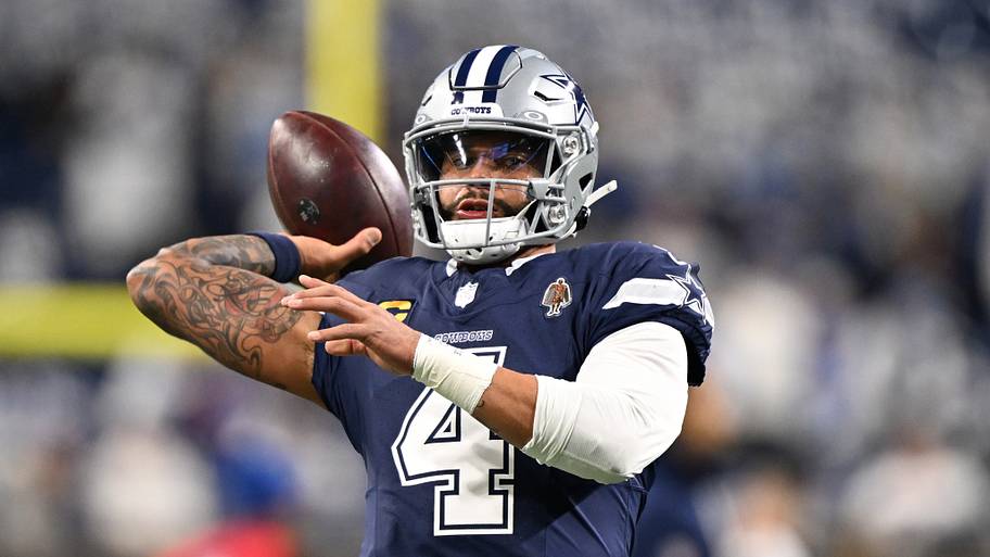 Dallas Cowboys quarterback Dak Prescott (4) warms up before a game against the Detroit Lions at Ford Field.