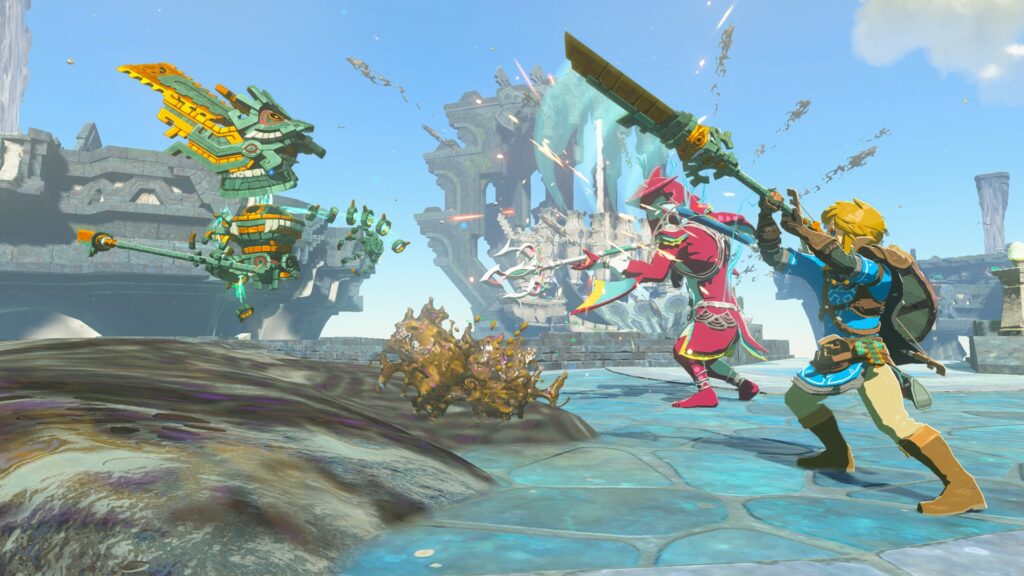 Link and Sidon fighting a mechanical construct in a screenshot for The Legend of Zelda Tears of the Kingdom