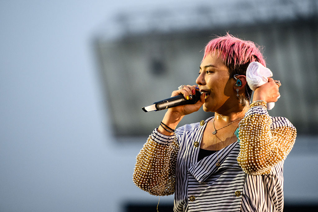 G-Dragon, a member of K-pop group BIGBANG, performs as a guest during South Korean rapper PSY's 'Summer Swag 2025' opening tour concert at the Incheon Asiad Main Stadium in Incheon on June 28, 2025. ©ANTHONY WALLACE/AFP via Getty Images)/Getty Images