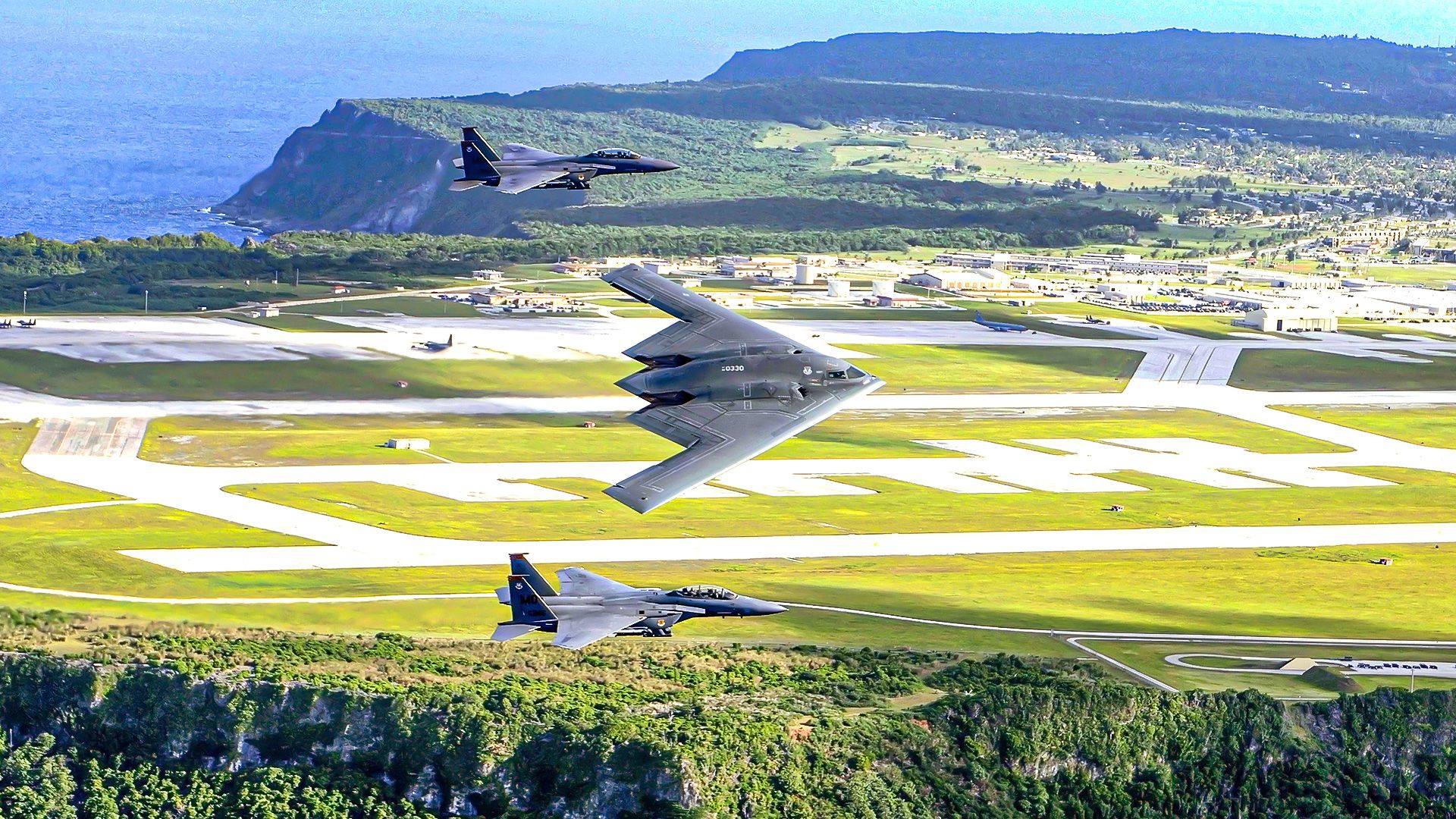 The US Air Force is pouring 20 acres of concrete at Guam's Andersen AFB but refuses to build shelters