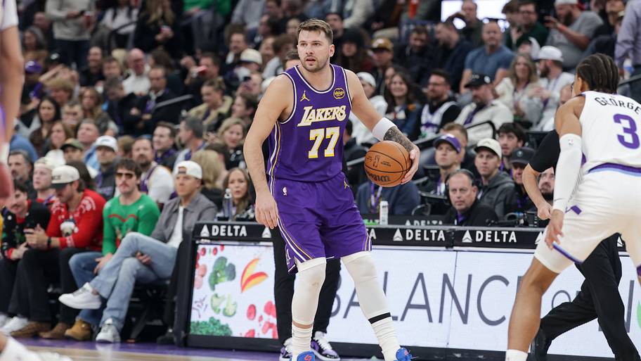 Dec 18, 2025; Salt Lake City, Utah, USA; Los Angeles Lakers forward/guard Luka Doncic (77) dribbles during the first quarter