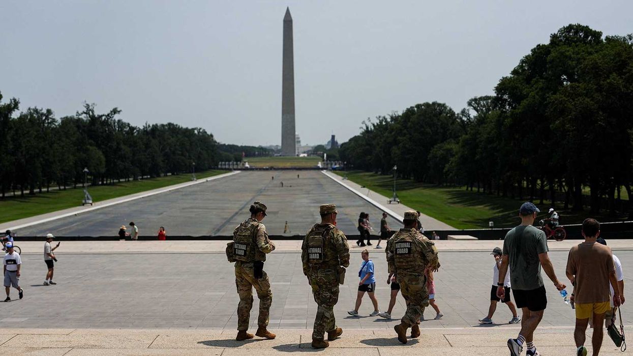 Members of the U.S. National Guard patrol near the drained Lincoln Memorial Reflecting Pool, following renovations and Independence Day celebrations, in Washington, D.C., U.S., July 15, 2026. REUTERS/Al Drago