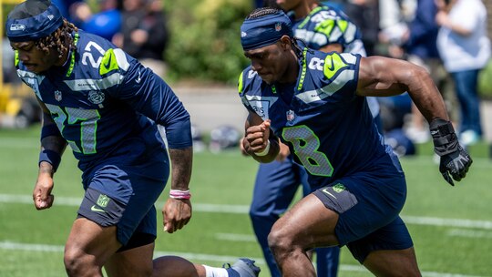 Seahawks running back Jadarian Price, right, and running back Emanuel Wilson take part in practice at the team's training faility, Tuesday, June 9