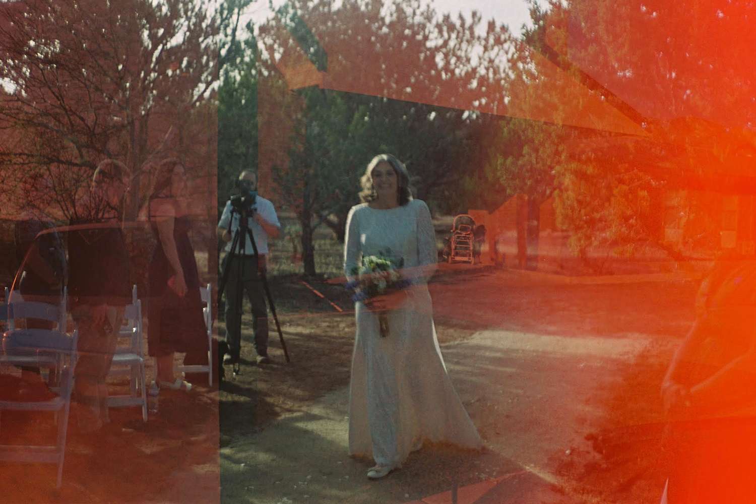 Bride in shock after spotting her deceased father in wedding photos (exclusive)