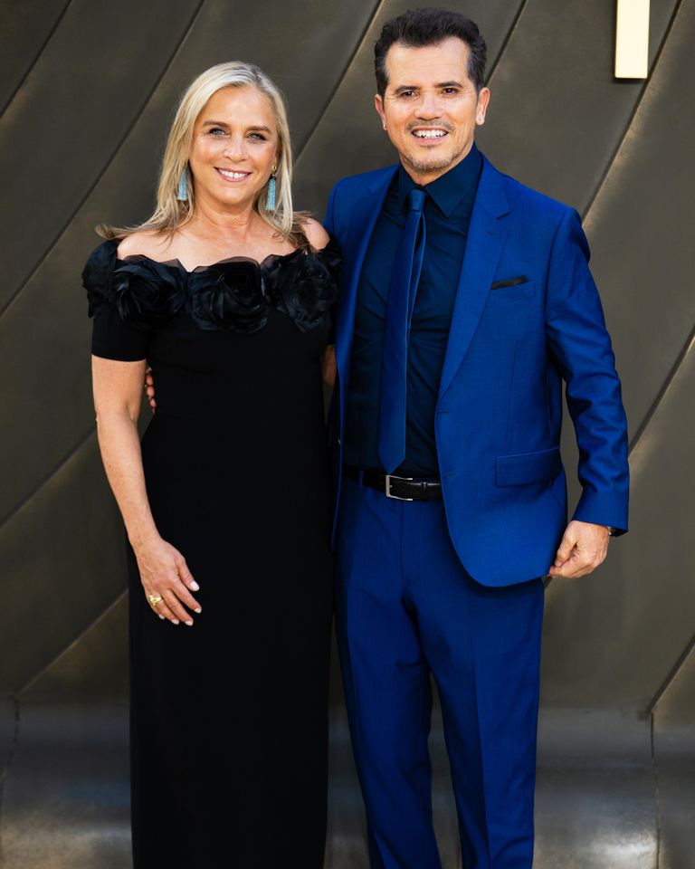 John Leguizamo and Justine Maurer attend the world premiere of