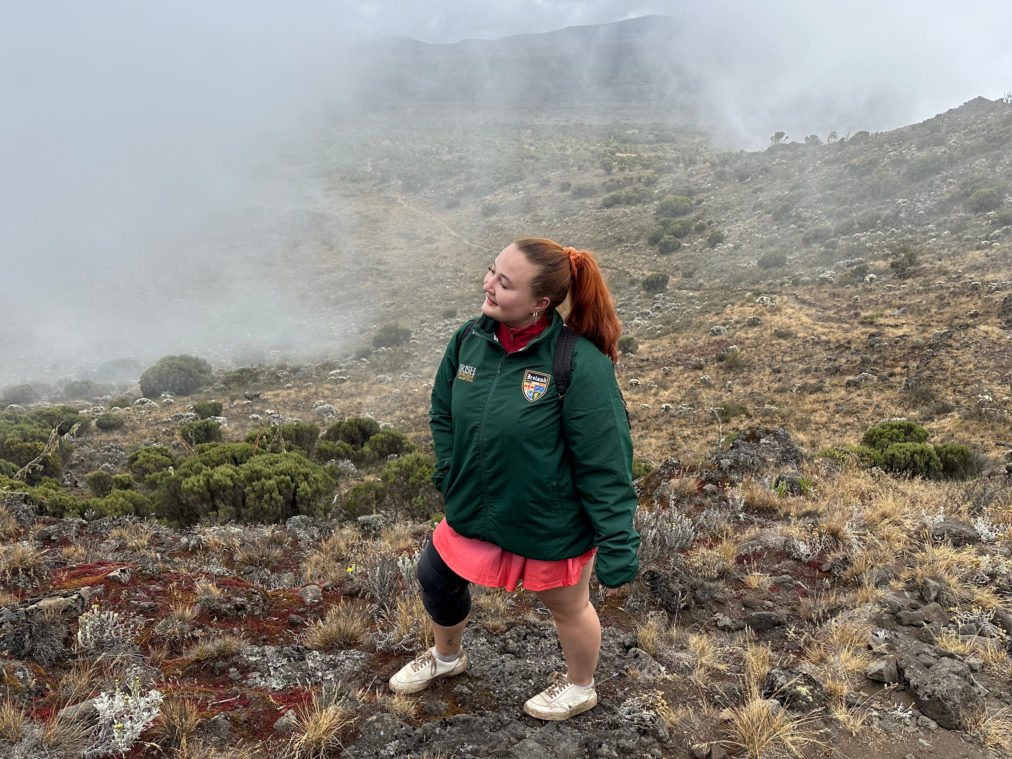 Annmarie stands in a foggy area on Mount Kilimanjaro.