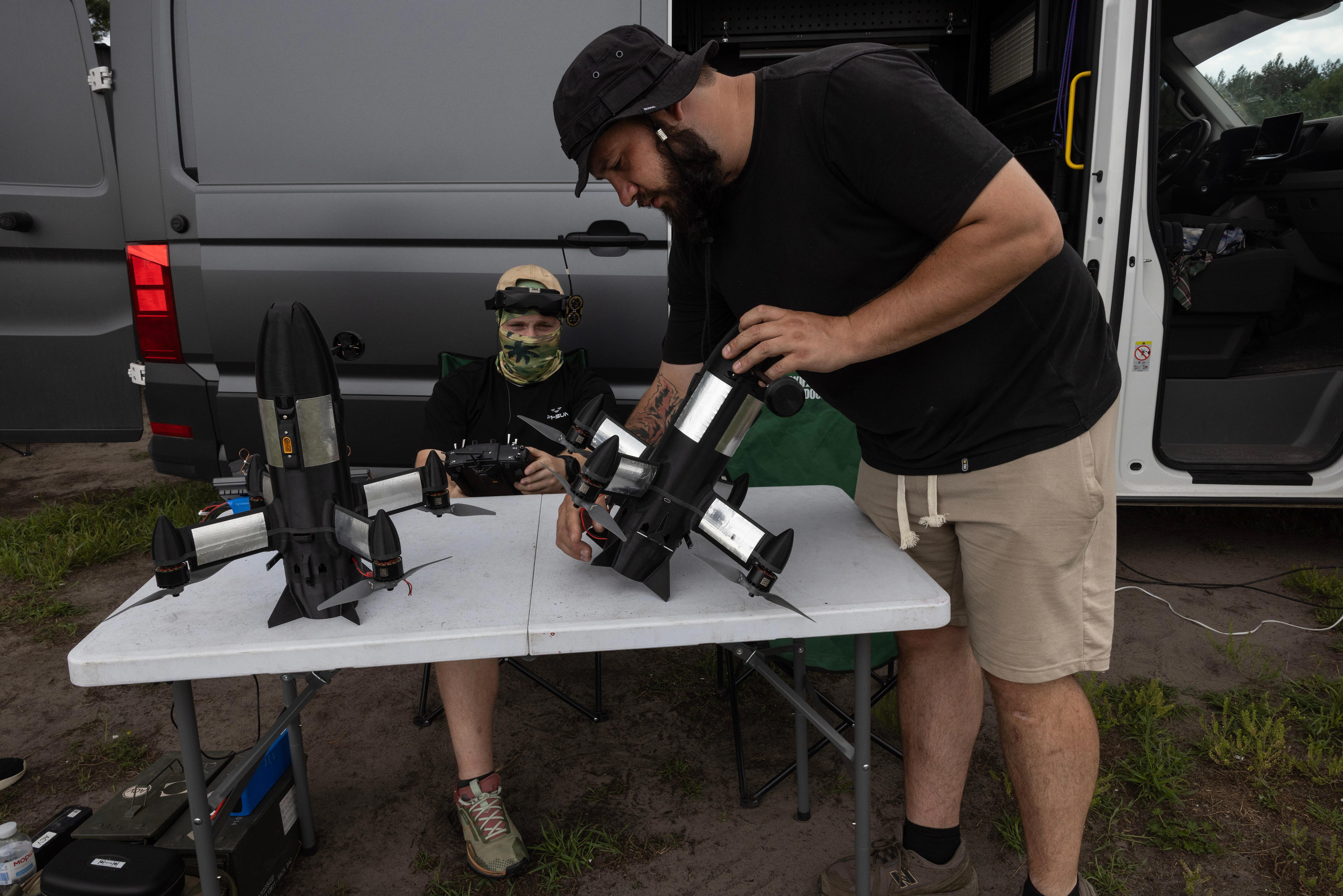 Drone pilots set up the P1-SUN Long Interceptor Drone during a live demonstration on July 7, 2026, in Central Ukraine.