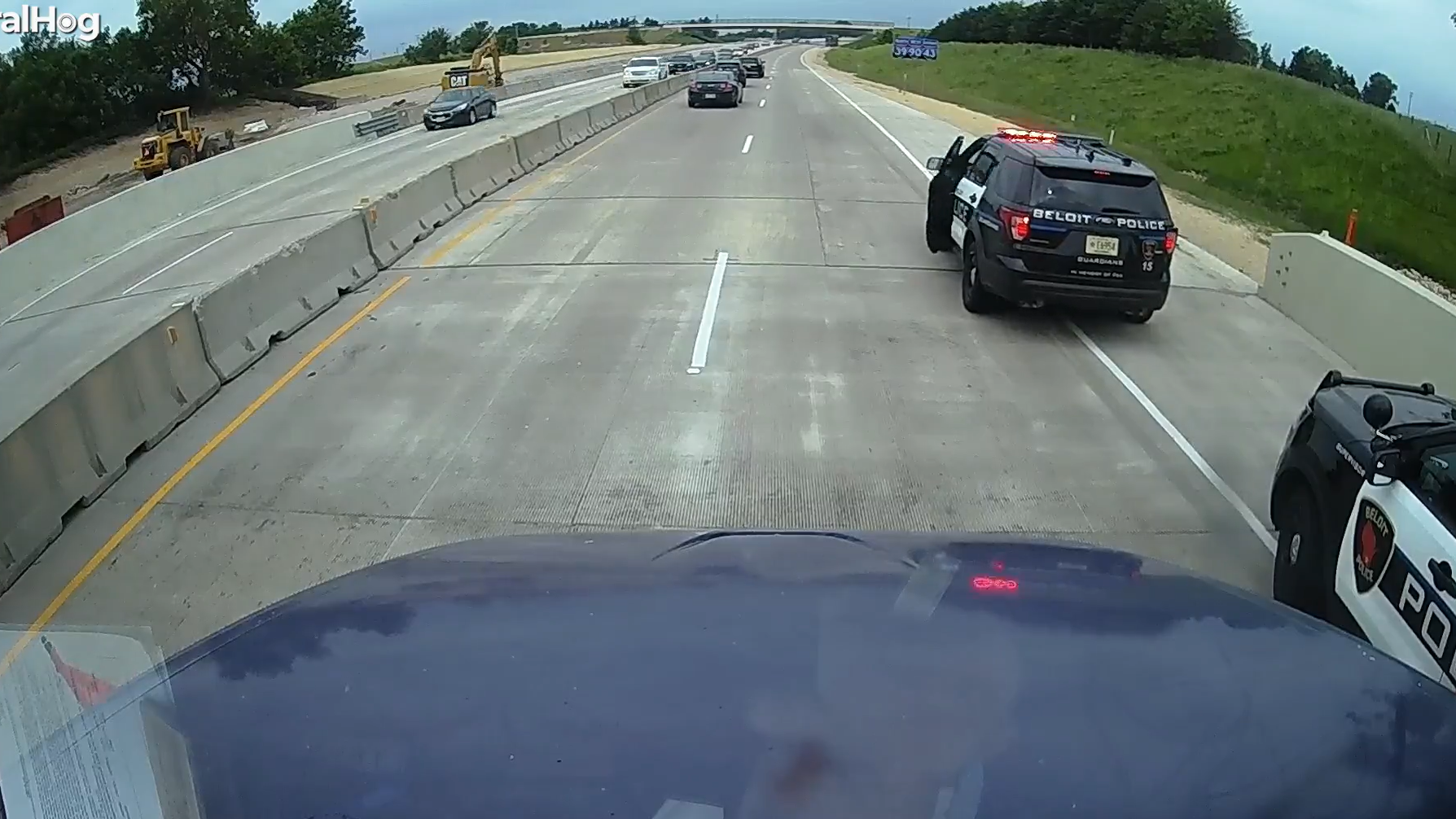 Woman bails out of police car's back seat