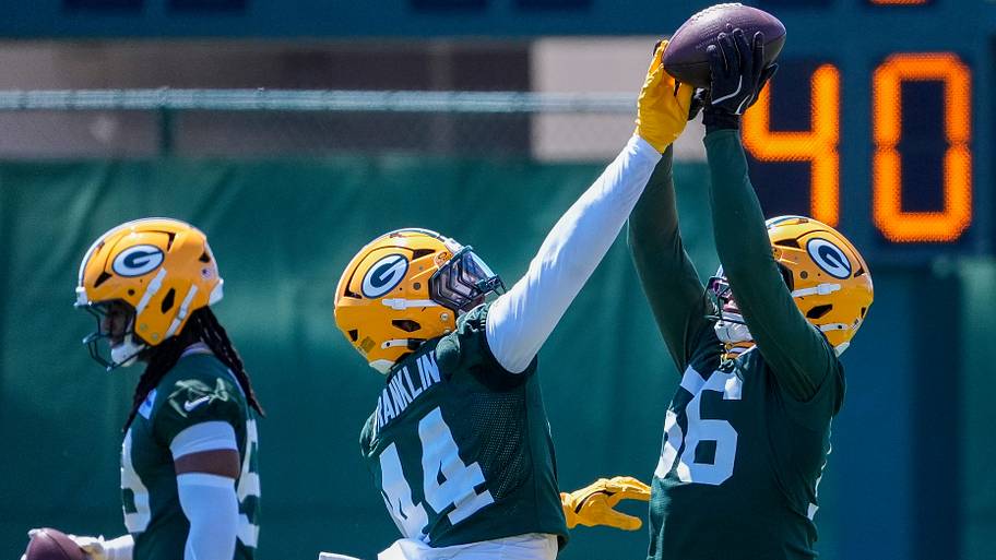 Green Bay Packers linebacker Zaire Franklin (44) tries to knock the ball away from linebacker Edgerrin Cooper during OTAs.