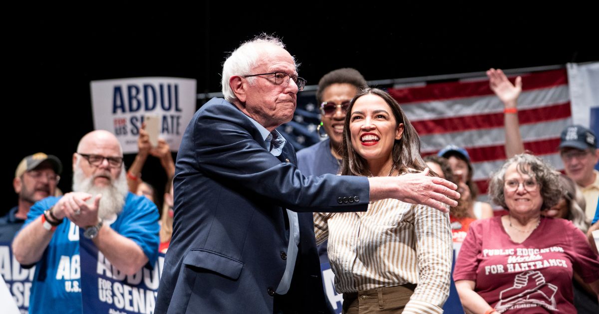 AOC Walks Off Rally Stage Early to Avoid Potentially Damaging Photo