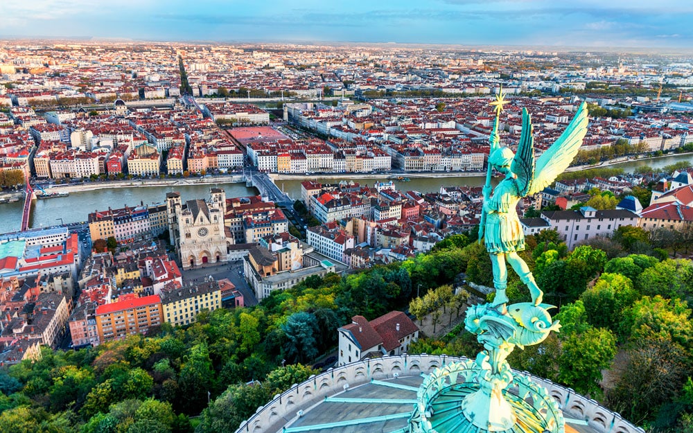 Take a funicular ride up to Fourvière to admire views of Lyon from the basilica; Lyon travel guide