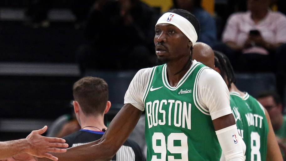 Boston Celtics forward Chris Boucher reacts with guard Derrick White during the third quarter against the Memphis Grizzlies