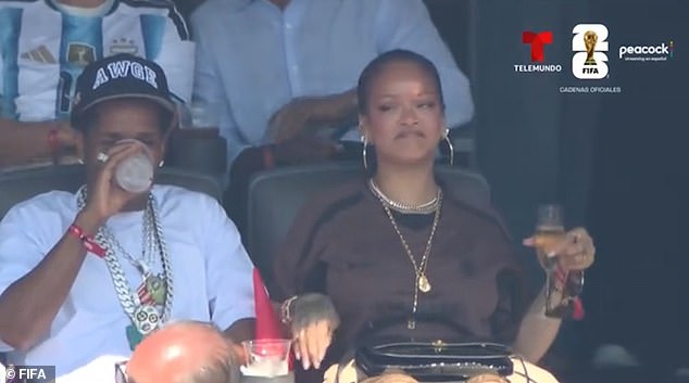 Sat alongside her boyfriend ASAP Rocky, the star didn't even pause to put down her champagne during her muted version of the dance