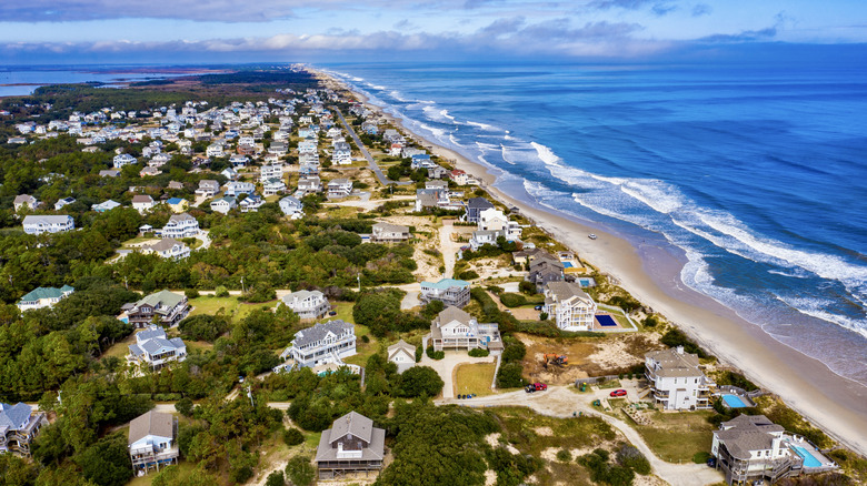 North Carolina's Untamed Beach Town Is Home To Roaming Mustangs, Rolling Dunes, And Quiet Sands