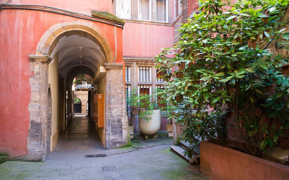 Lyon's traboules zig-zag to ancient courtyards, stairwells, wall frescoes and staircases; best things to do in Lyon