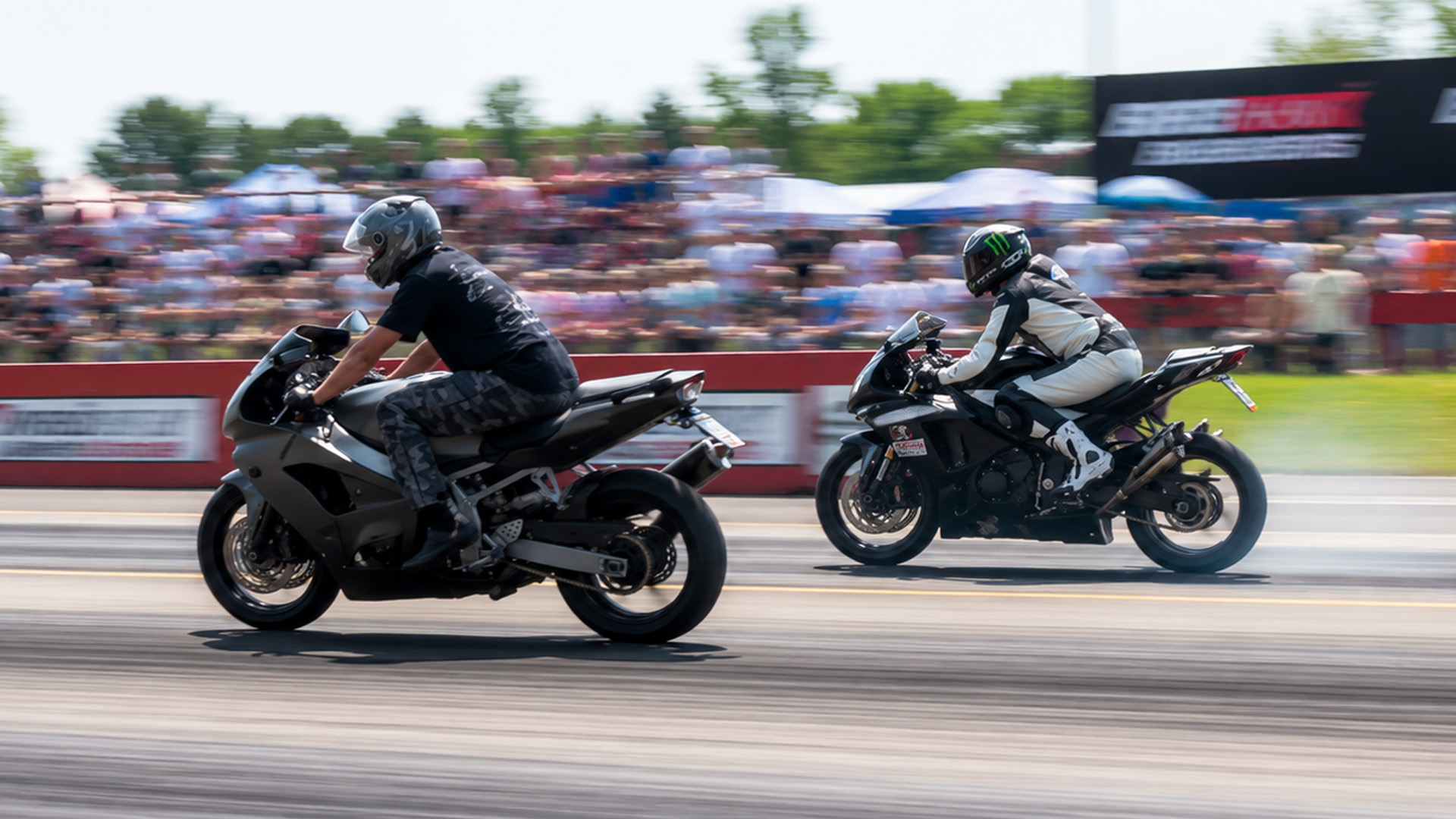 Motorcycle 1/4 mile drag race with full acceleration action
