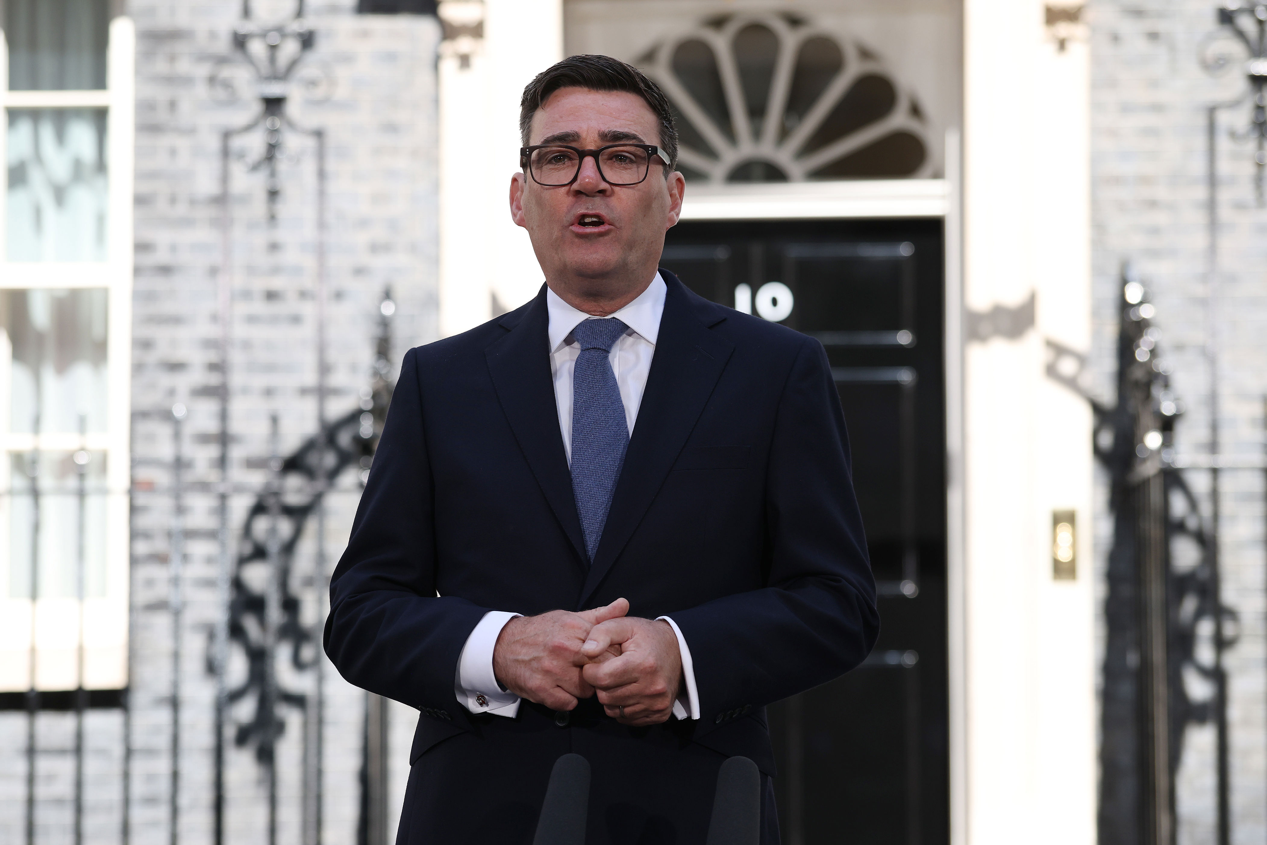 A UK prime minister takes charge with a promise to dilute power