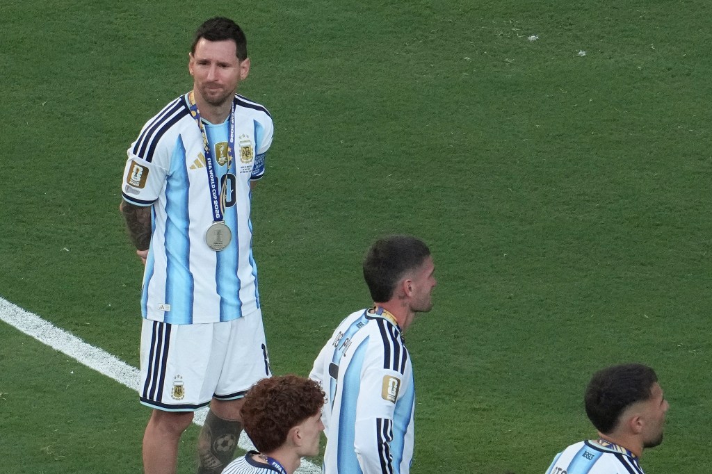 Argentina's forward #10 Lionel Messi with his silver medal looks on during the final ceremony after the 2026 World Cup football tournament final match between Spain and Argentina at the New York/New Jersey Stadium in East Rutherford on July 19, 2026. (Photo by TIMOTHY A. CLARY / AFP via Getty Images)