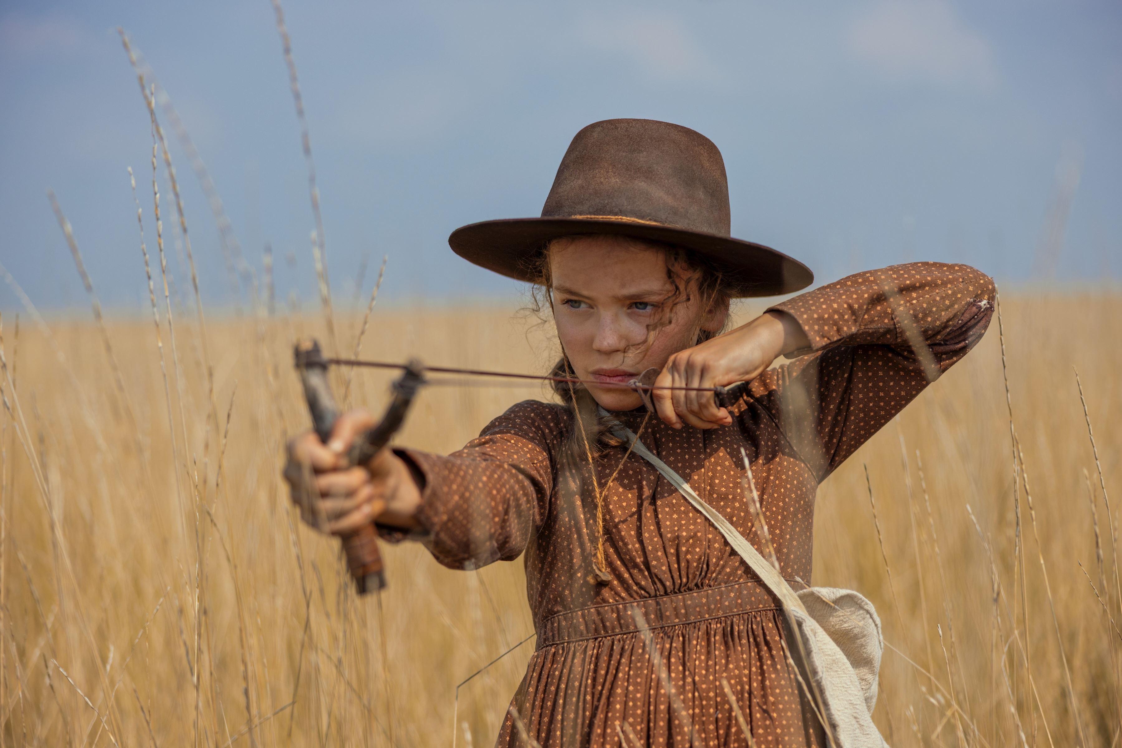 This image released by Netflix shows Alice Halsey as Laura Ingalls in a scene from