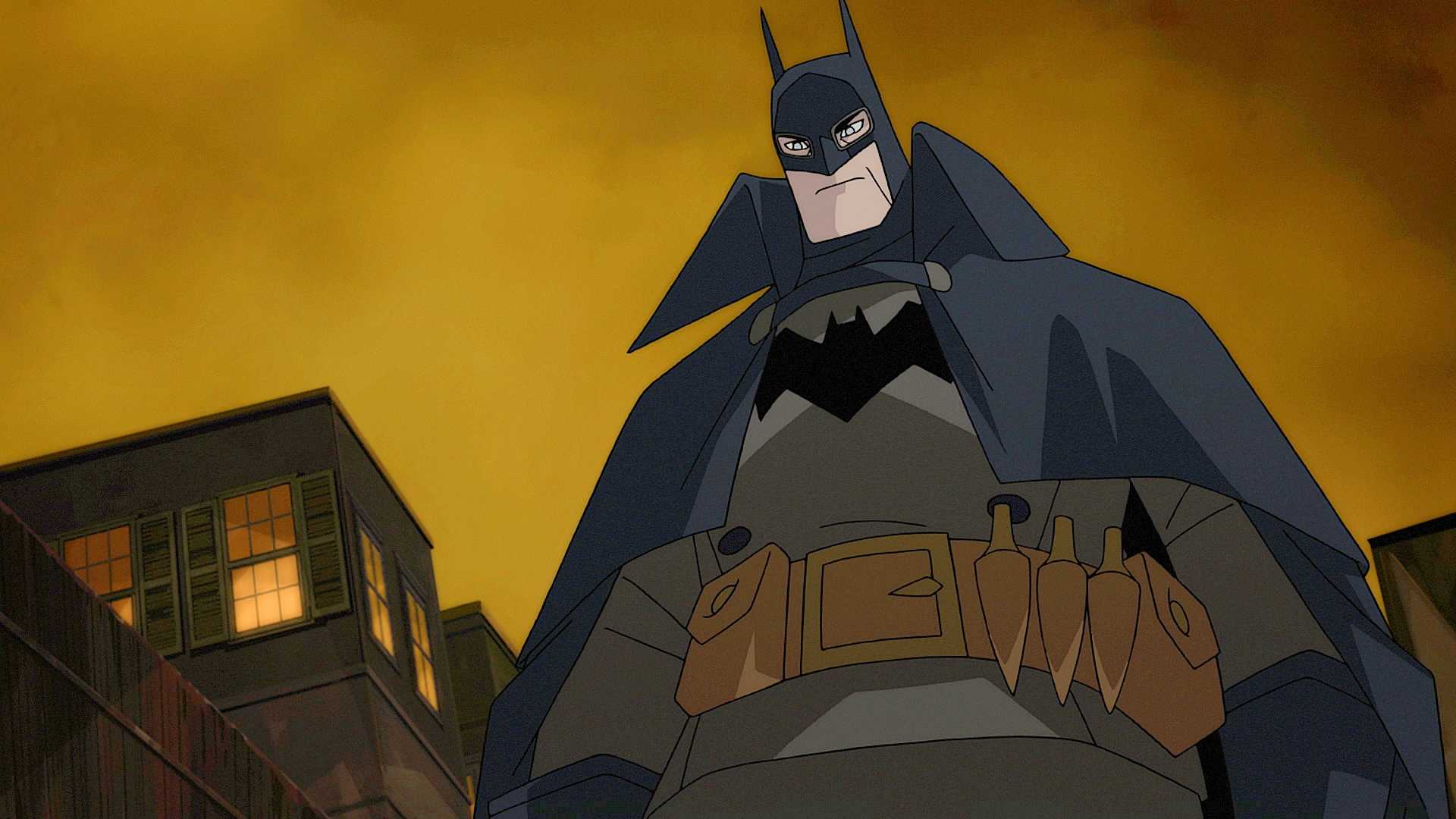 Batman standing against a smoggy sky in Gotham by Gaslight