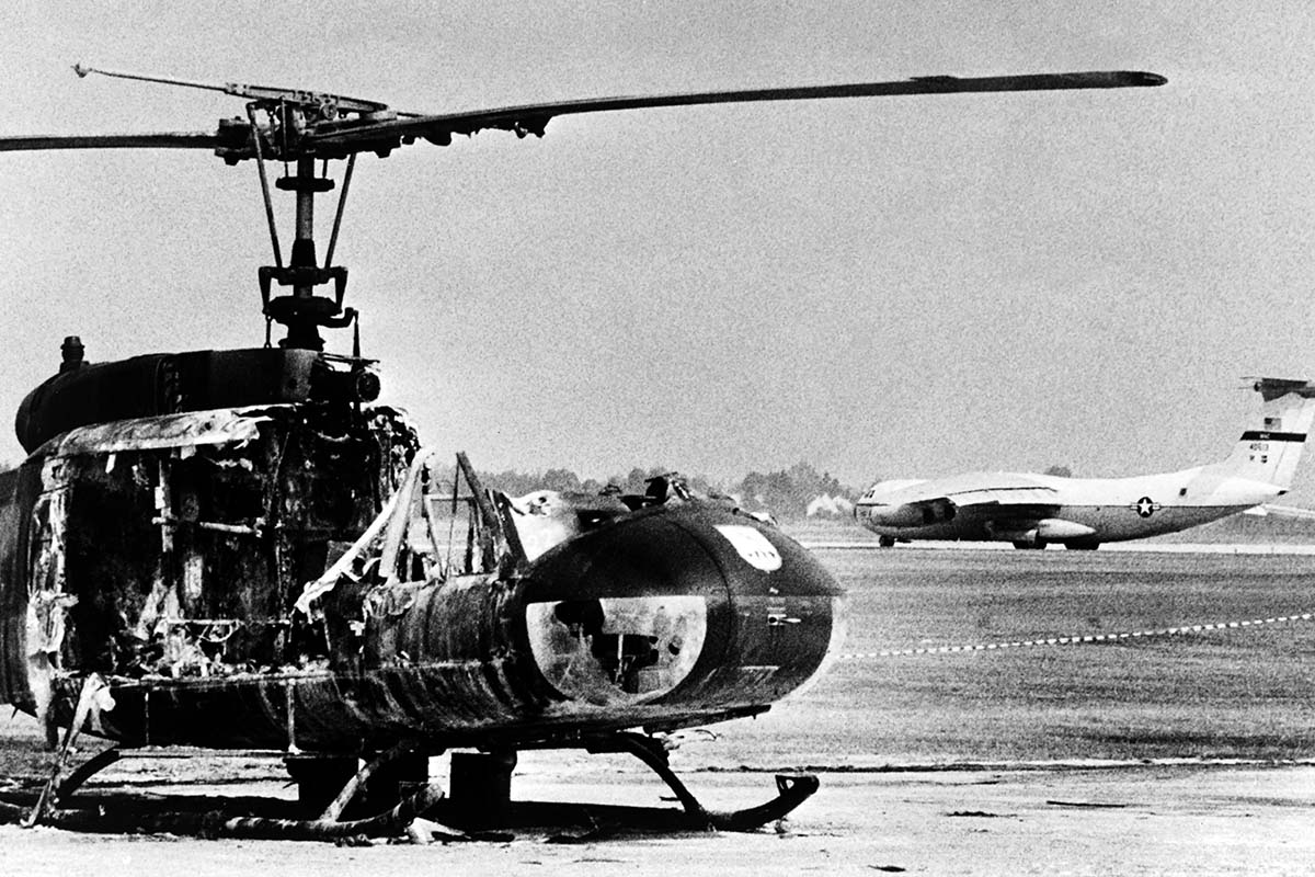 A burned-out army helicopter stands on Fürstenfeldbruck Air Base in southern Germany on September 7, 1972, after a shootout involving Palestinian terrorists who took 11 Israelis hostage at the Munich Olympics. (EPU/AFP via Getty Images)