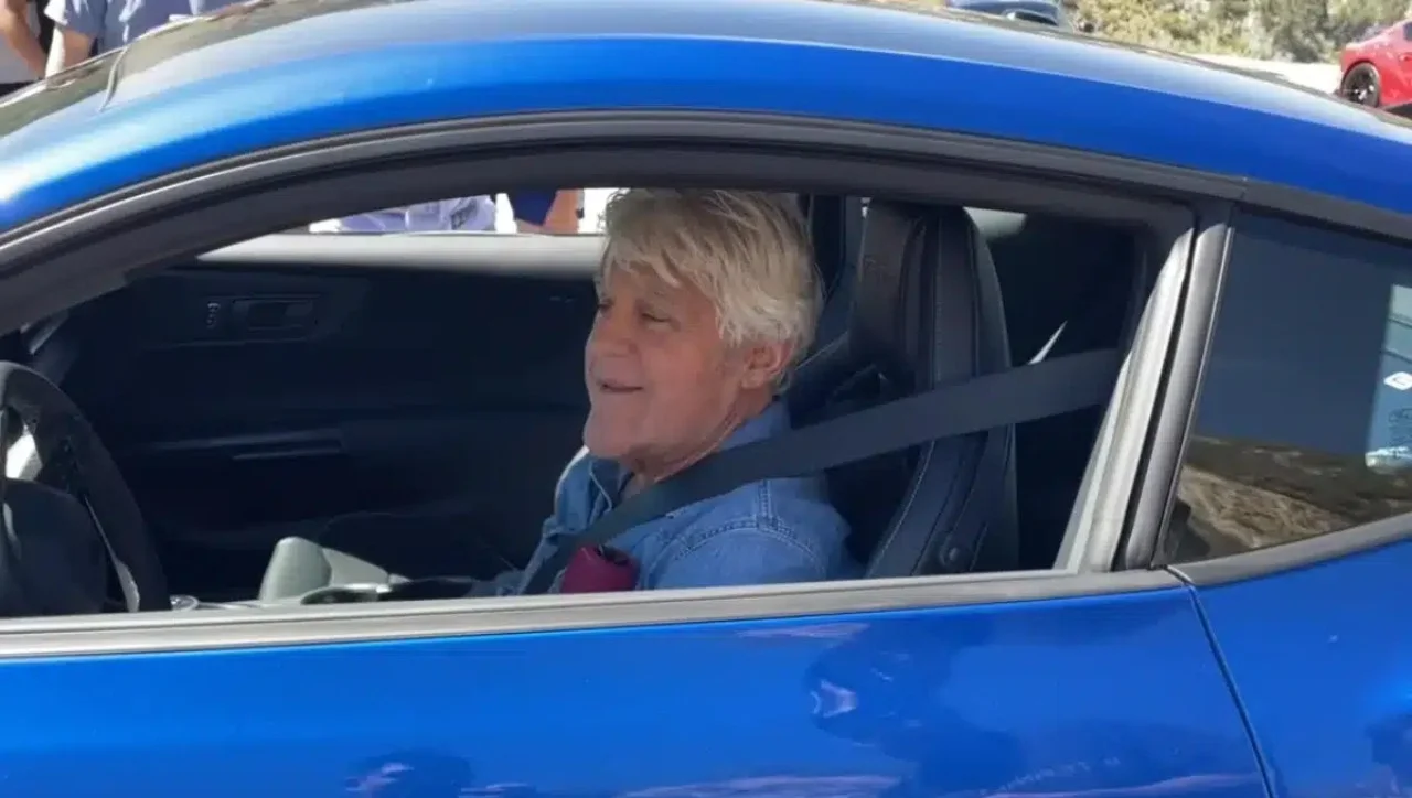 Jay Leno turns everyone's heads after he shows up uninvited to car meet in his brand new Ford Mustang GTD that Ford's CEO gave him