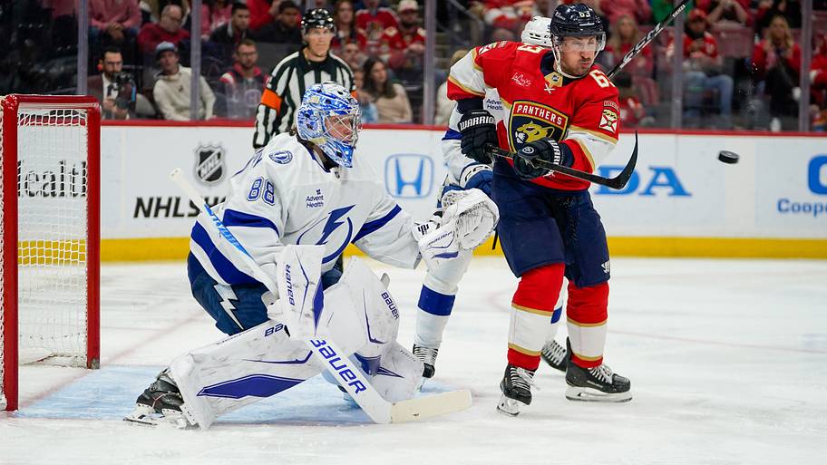 Andrei Vasilevskiy and Brad Marchand