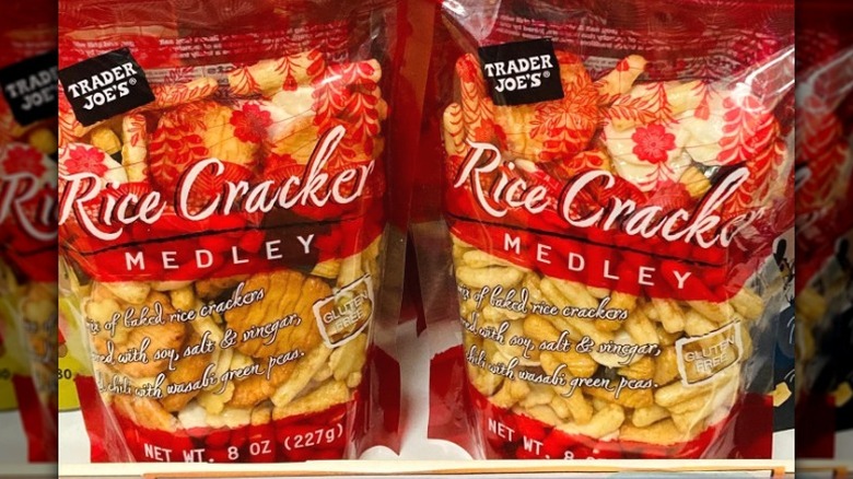 Bags of Trader Joe's Rice Cracker Medley on the shelf.
