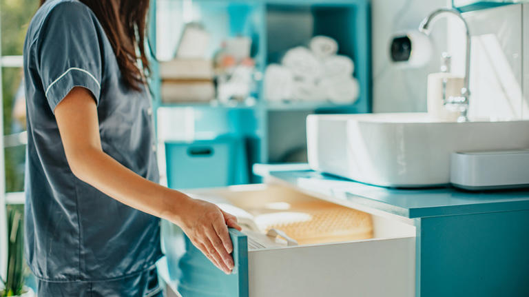 Woman turns old wall decor into countertop storage with a clever DIY ...