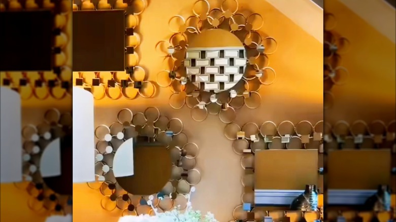 Decorative gold wall fixtures made from shower curtain rings