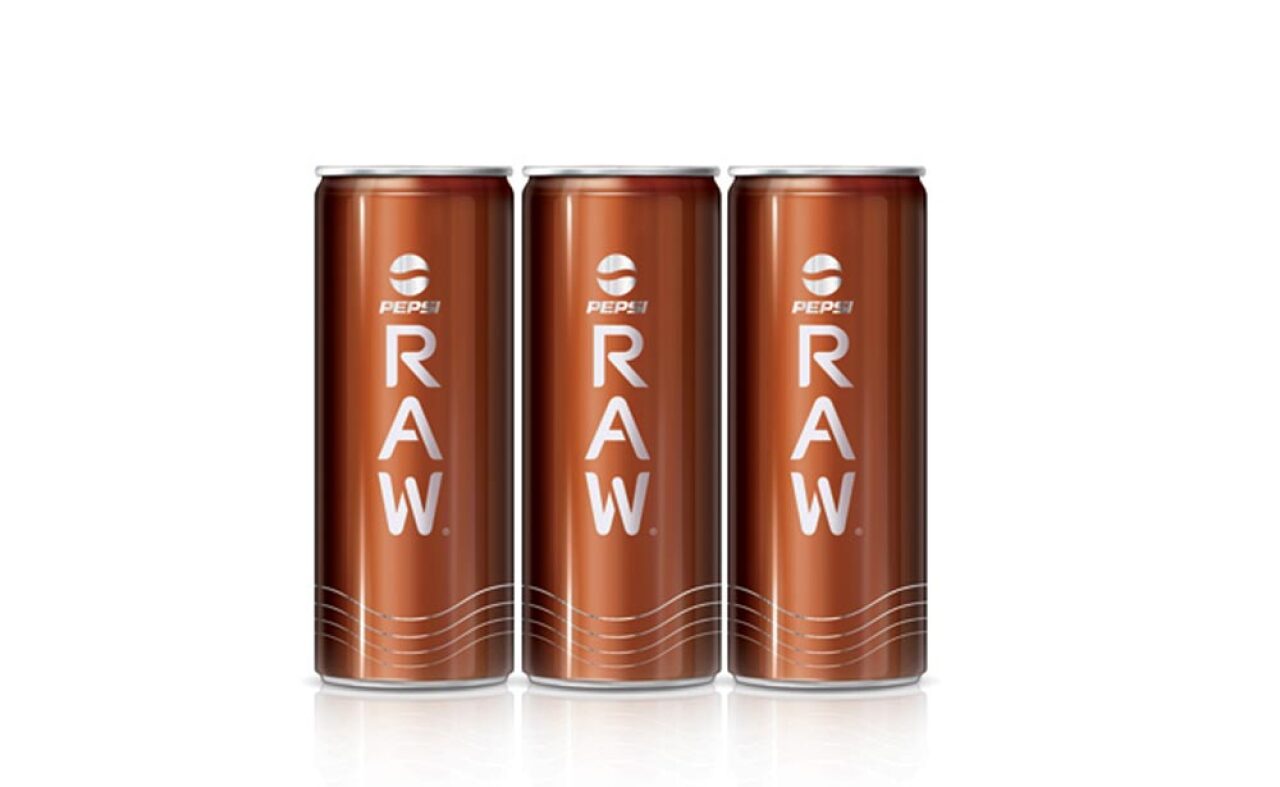 Three cans of Pepsi Raw