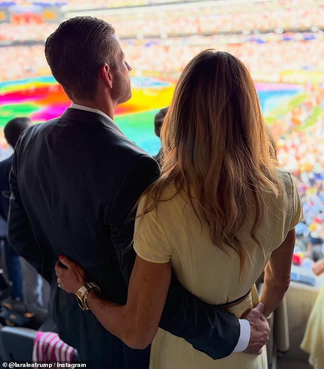 Another snap featured Lara and Eric with their arms wrapped around each other's waists, as they looked out toward the soccer field