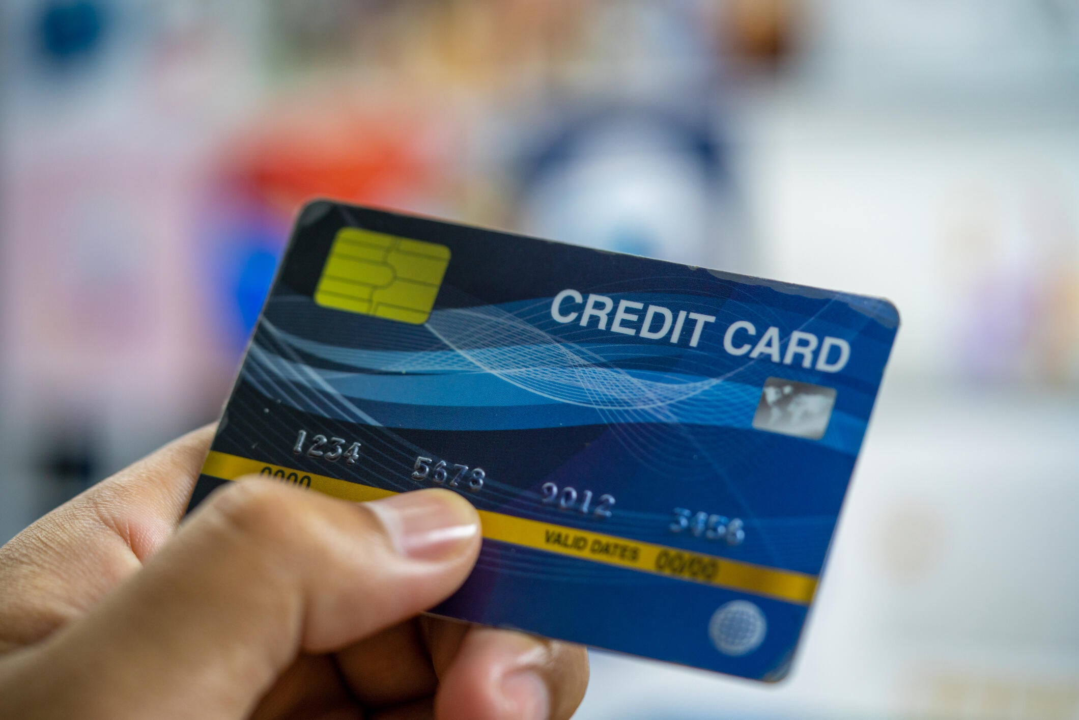 Being an authorized user allows you to use another person's credit card, but does it come with legal responsibilities? / Credit: Boonchai Wedmakawand/Getty Images