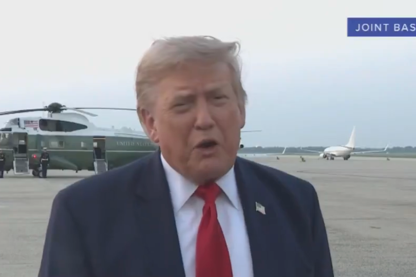 Donald Trump spoke to reporters at the airbase
