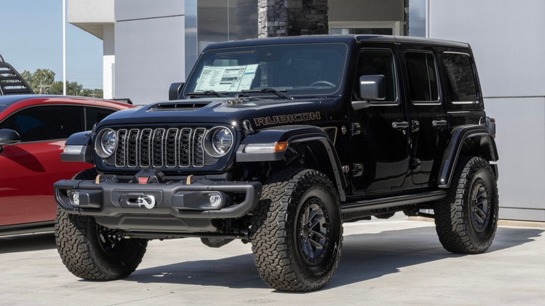 A "Final Edition" Rubicon 392 Jeep Wrangler parked in front of a dealership.