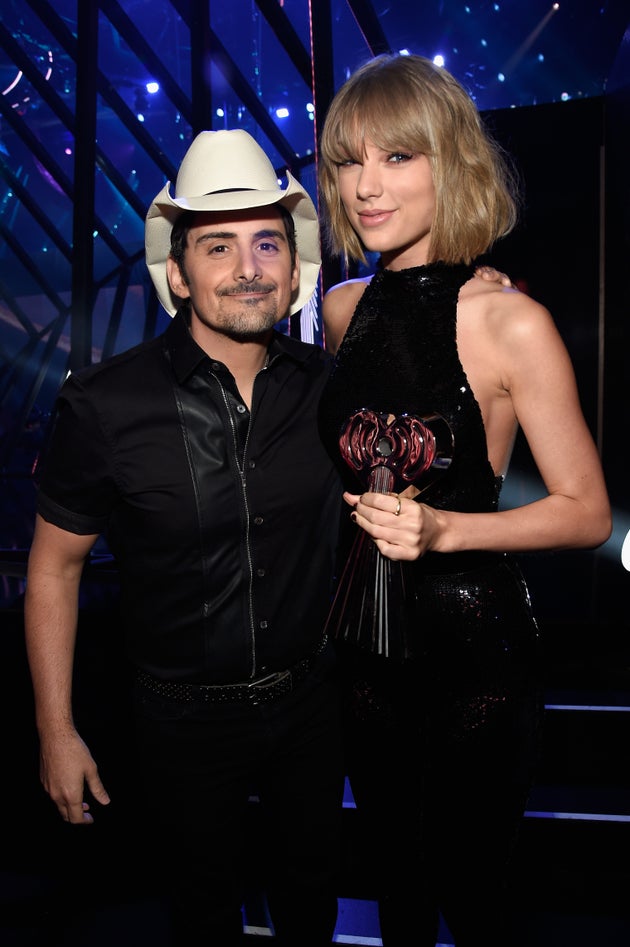 Brad Paisley and Taylor Swift pose backstage at the iHeartRadio Music Awards on April 3, 2016, in Inglewood, California.