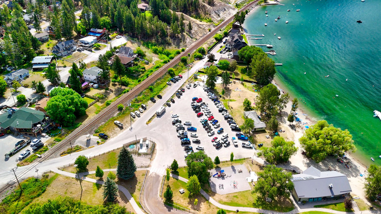 Houses edge up to the side of Windermere Lake in British Columbia