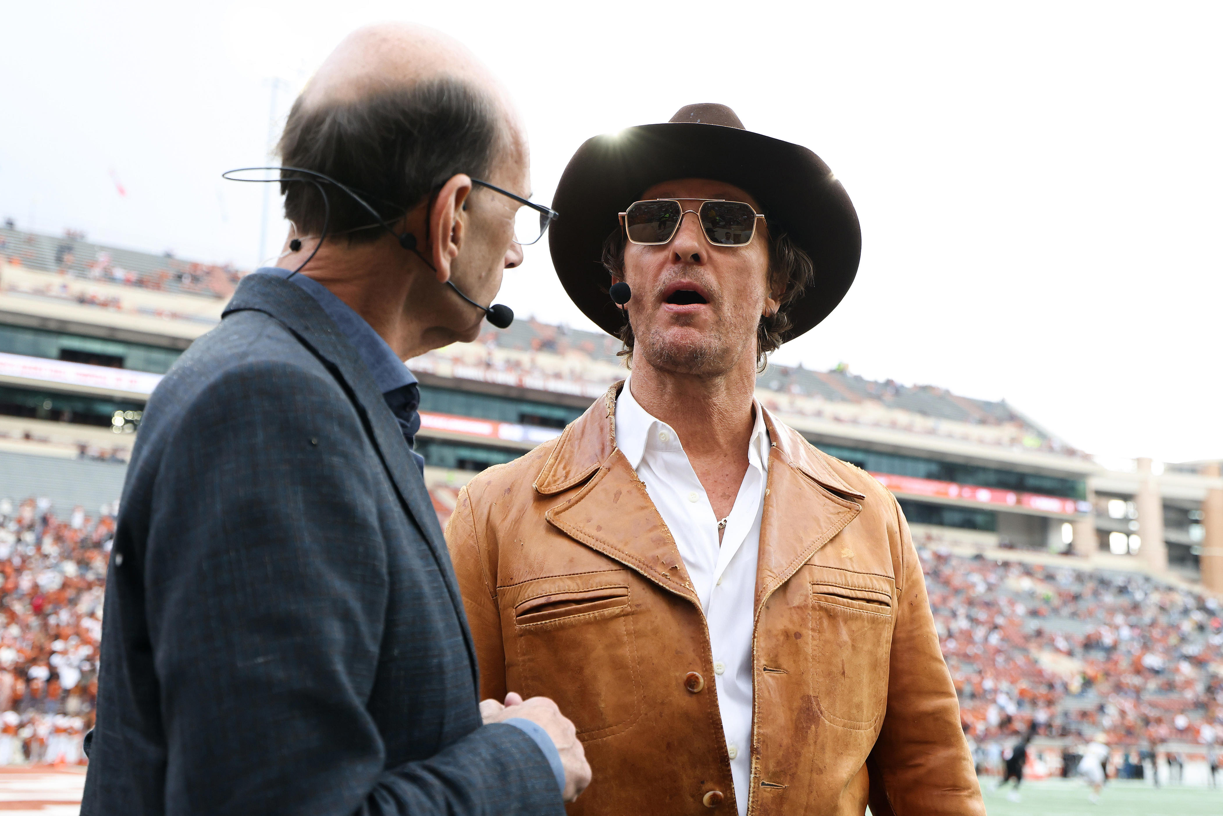 AUSTIN, TEXAS - NOVEMBER 01: Actor Matthew McConaughey speaks with Paul Finebaum prior to the game between the Vanderbilt Commodores and the Texas Longhorns at Darrell K Royal-Texas Memorial Stadium on November 01, 2025 in Austin, Texas. (Photo by Kenneth Richmond/Getty Images)