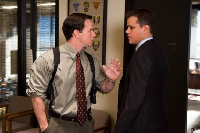 Matt Damon and his apparent lookalike, Mark Wahlberg, appear side by side in a scene from ‘The Departed.’ / 2006 Warner Bros. Entertainment Inc.