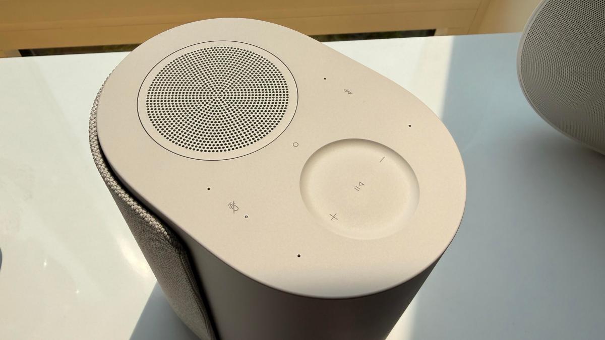 The top of a white Bose Lifestyle Speaker showing its height driver and touch controls.